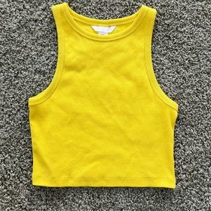 Bright, yellow tank top🫶🏾☺️